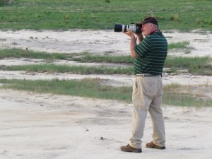 Kev Solomon doing what he really enjoys. Photographing finches wherever he can. Photo Eelco Meyjes